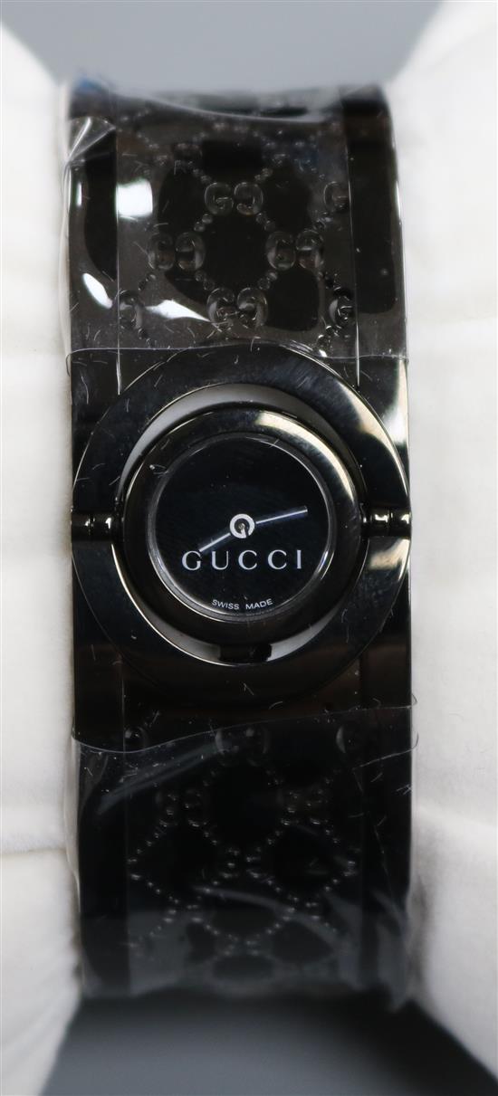 A ladys black steel Gucci Twirl quartz wrist watch, model no. YA1125531,